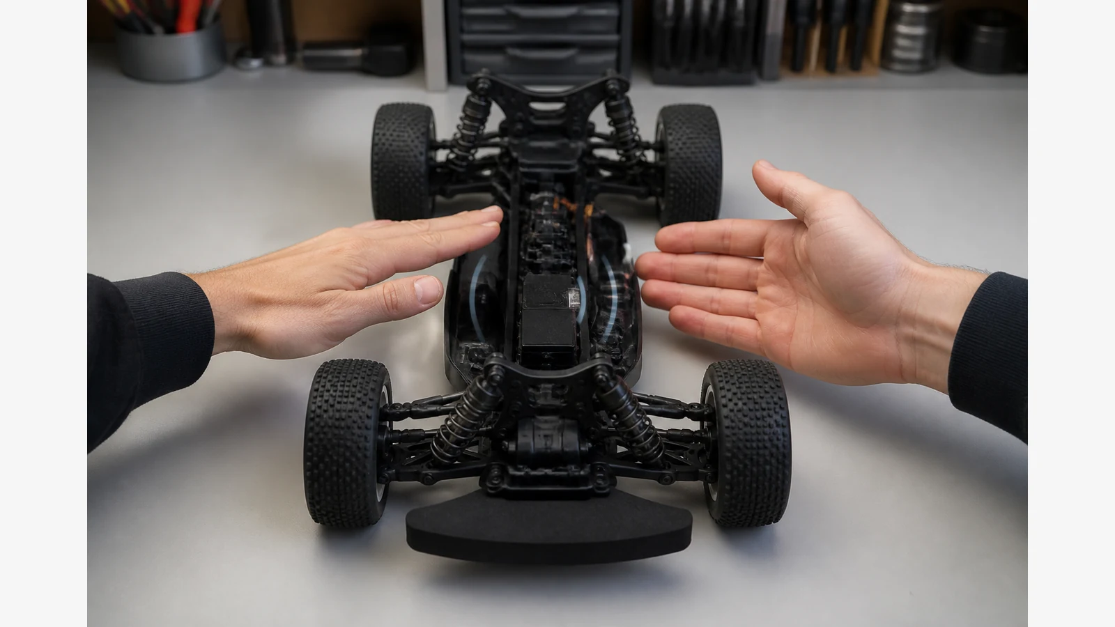 RC steering servo being checked for buzzing while the wheels remain centred